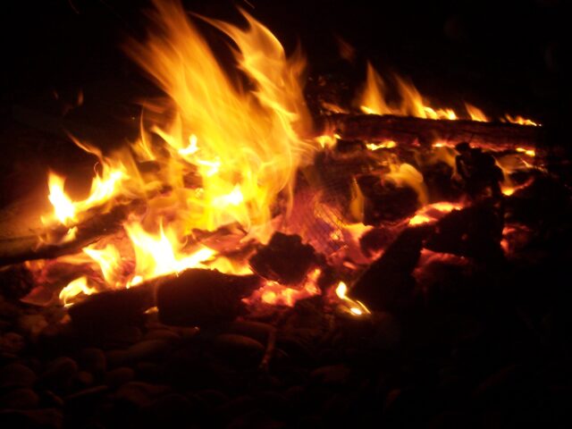 The fire burns.
