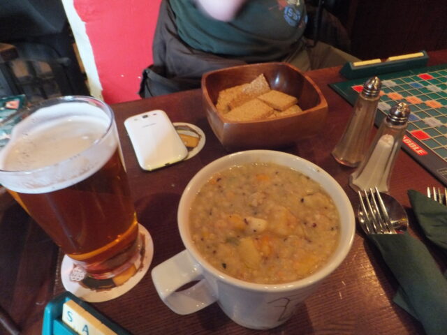 (Veggie) haggis stovie (in a mug), a bowl of oatcakes, and a pint of beer. (Veggie) haggis stovie (in a mug), a bowl of oatcakes, and a pint of beer.