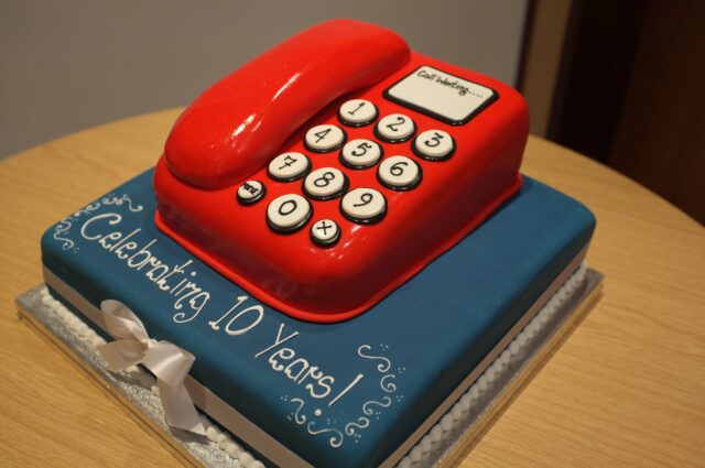The Three Rings Birthday Cake. It boggles my mind how they've managed to make the icing look so much like plastic, on the phone part. The Three Rings Birthday Cake. It boggles my mind how they've managed to make the icing look so much like plastic, on the phone part.