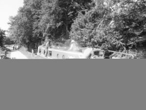 Matt, JTA and Ruth tie up the narrowboat after our first day's travel.