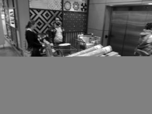 Our trolley full of shelves, in Ikea.