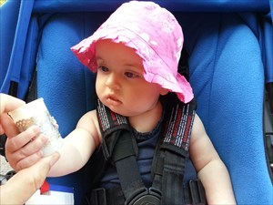 Baby Annabel with a geocache.