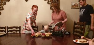 Sarah and Jemma feed the twins.