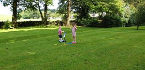 John and Annabel launch stomp rockets.