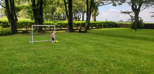 John plays football.