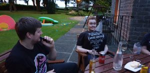 Jemma puts balloons up her top.