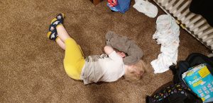 John sulks under his elephant.