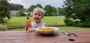 John eats fish fingers outdoors #1.