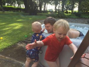 Kids outside the hot tub.