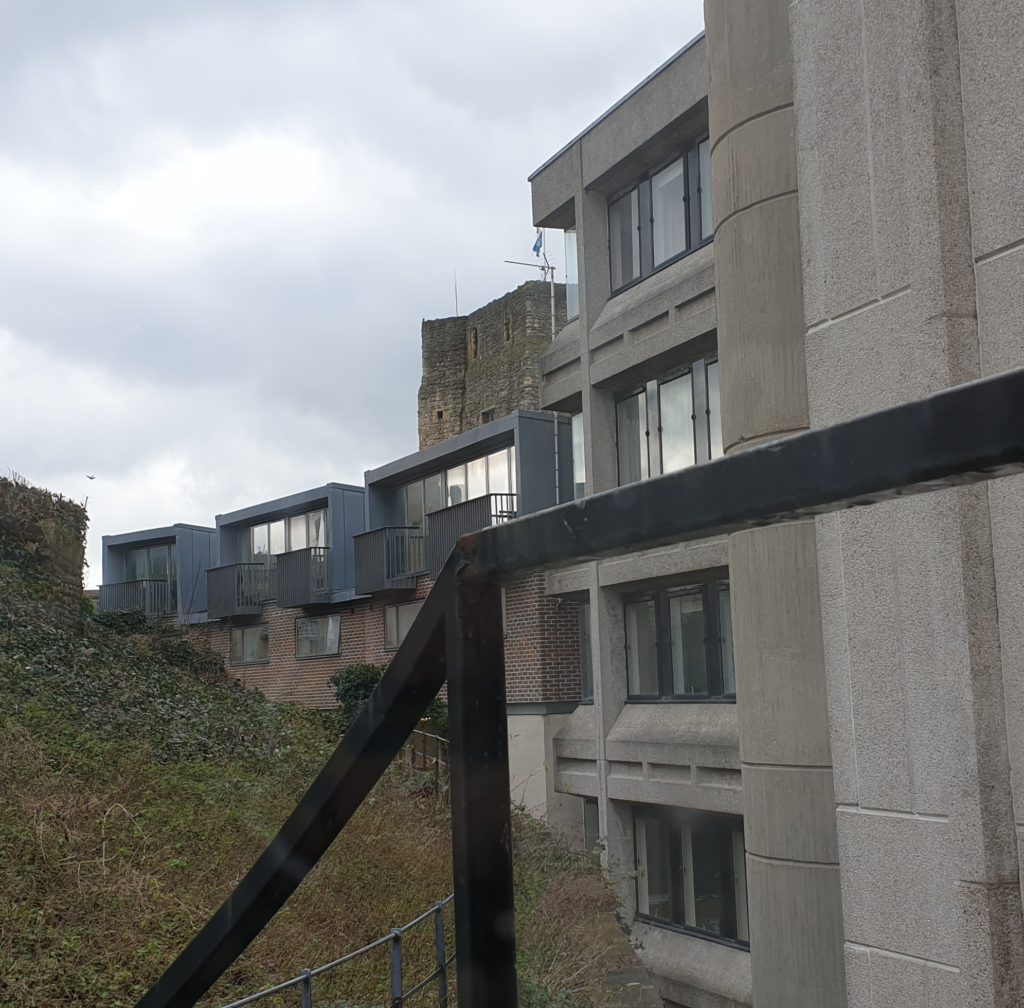 View of 1960s buildings in front of Oxford Castle.