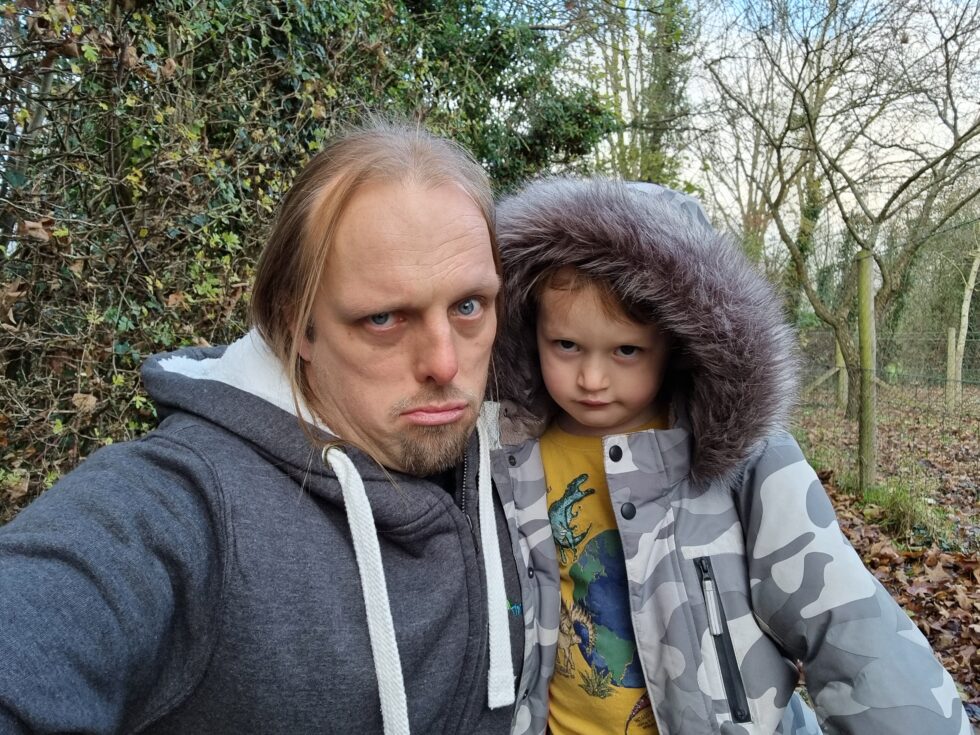 Dan and John look sad near the site of a possibly non-existent geocache.