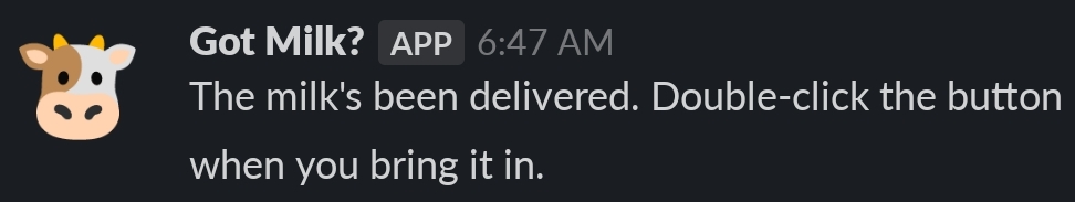 Screenshot from Slack showing the 'app' Got Milk? saying 'The milk's been delivered. Double-click the button when you bring it in.'