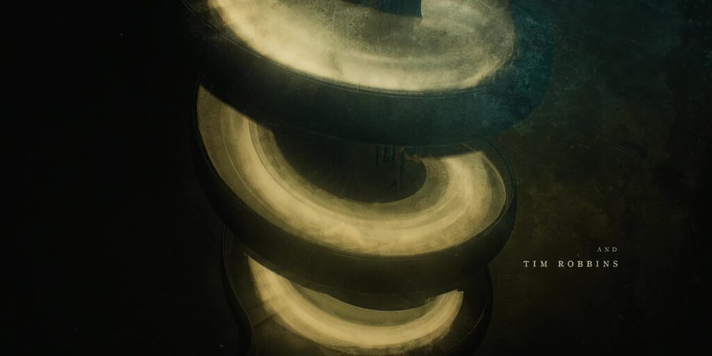 Spiral, shaking, with illuminated gaseos shapes whipping around it.