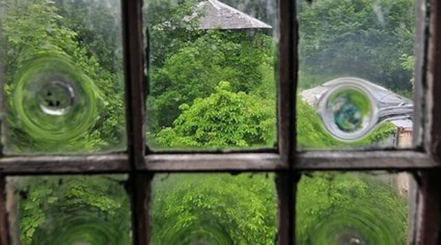 Multi-pane window with distinctive crown glass "circles".