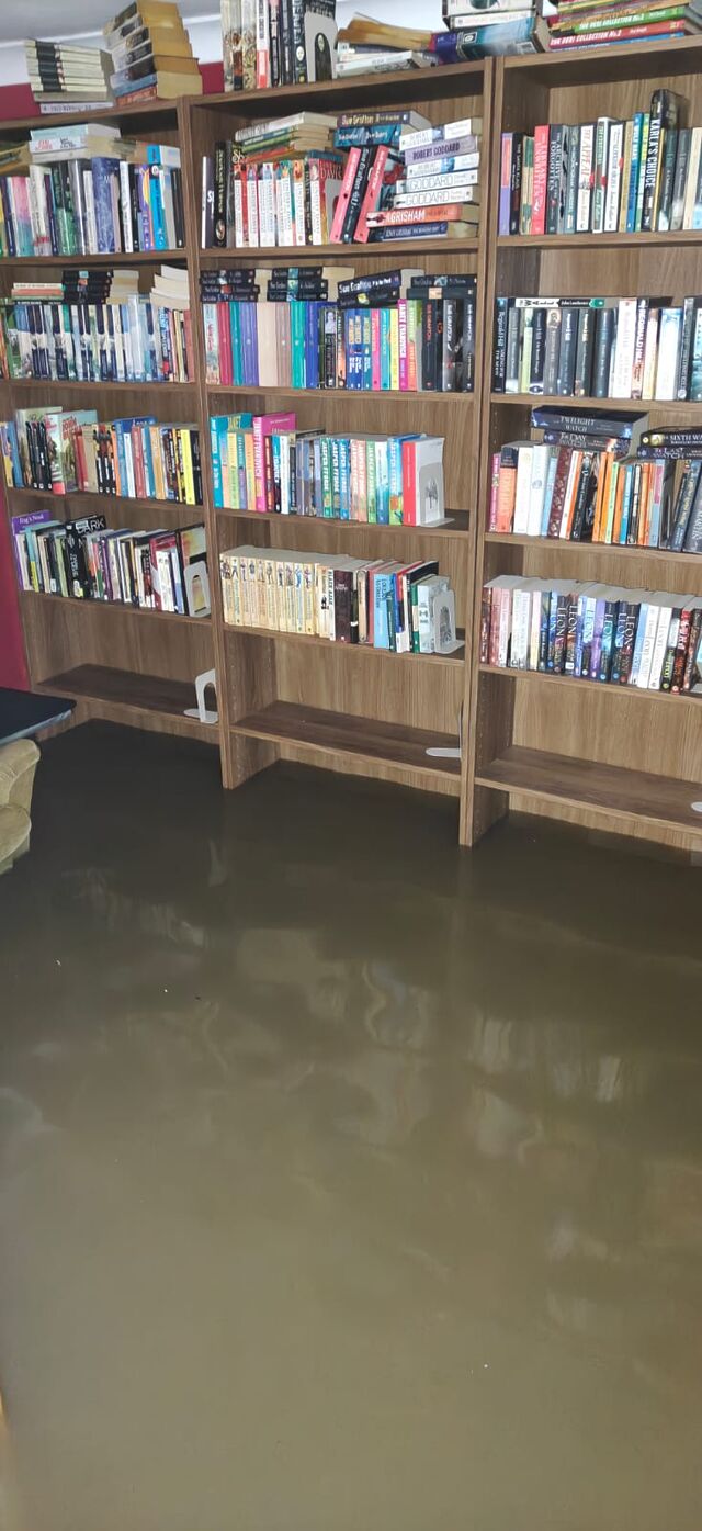 Flooded bookshelves.