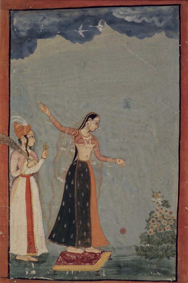 Watercolour Mughal painting showing a woman playing with a long-stringed yo-yo, with the extended tail held over her head in her second hand, while a second woman, holding a fan, watches.