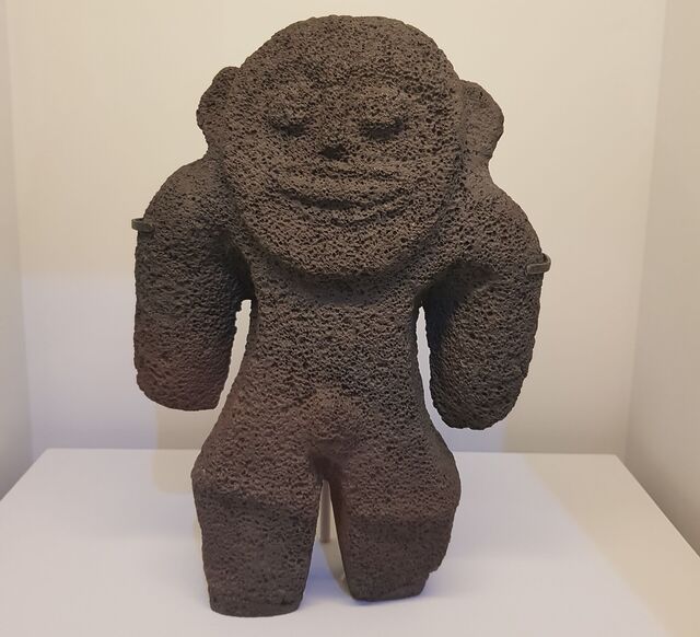 A carved stone figurine.