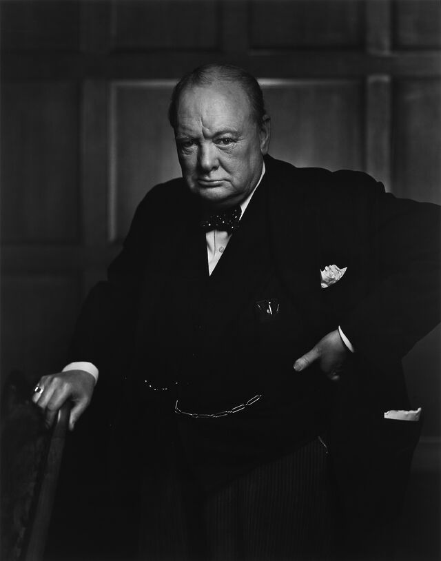 Monochrome photograph of Sir Winston Churchill.