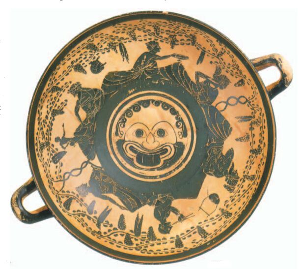 Interior of the Bomford Cup, a kylix with a face at the bottom whose nose is distinctly shaped like male genitalia.
