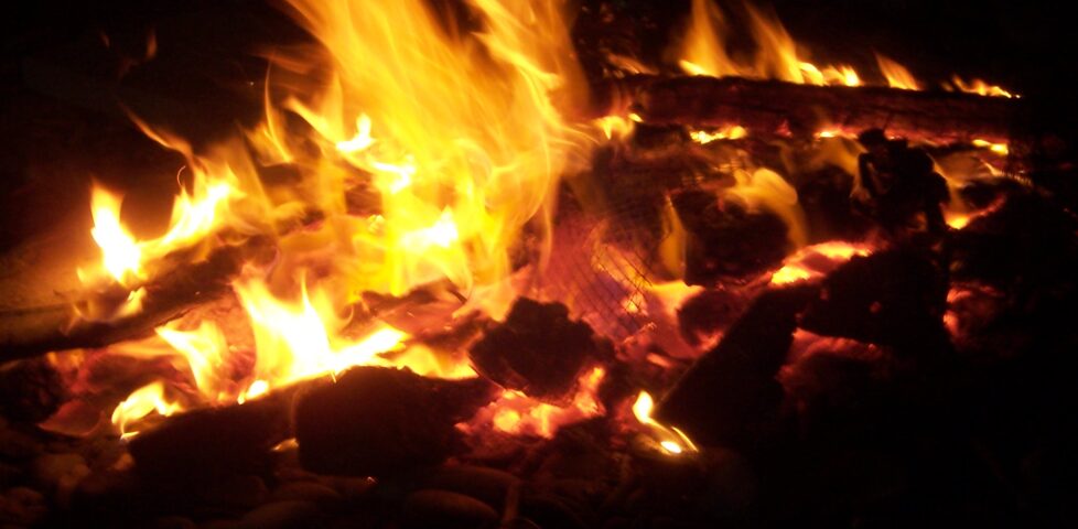 The fire burns.