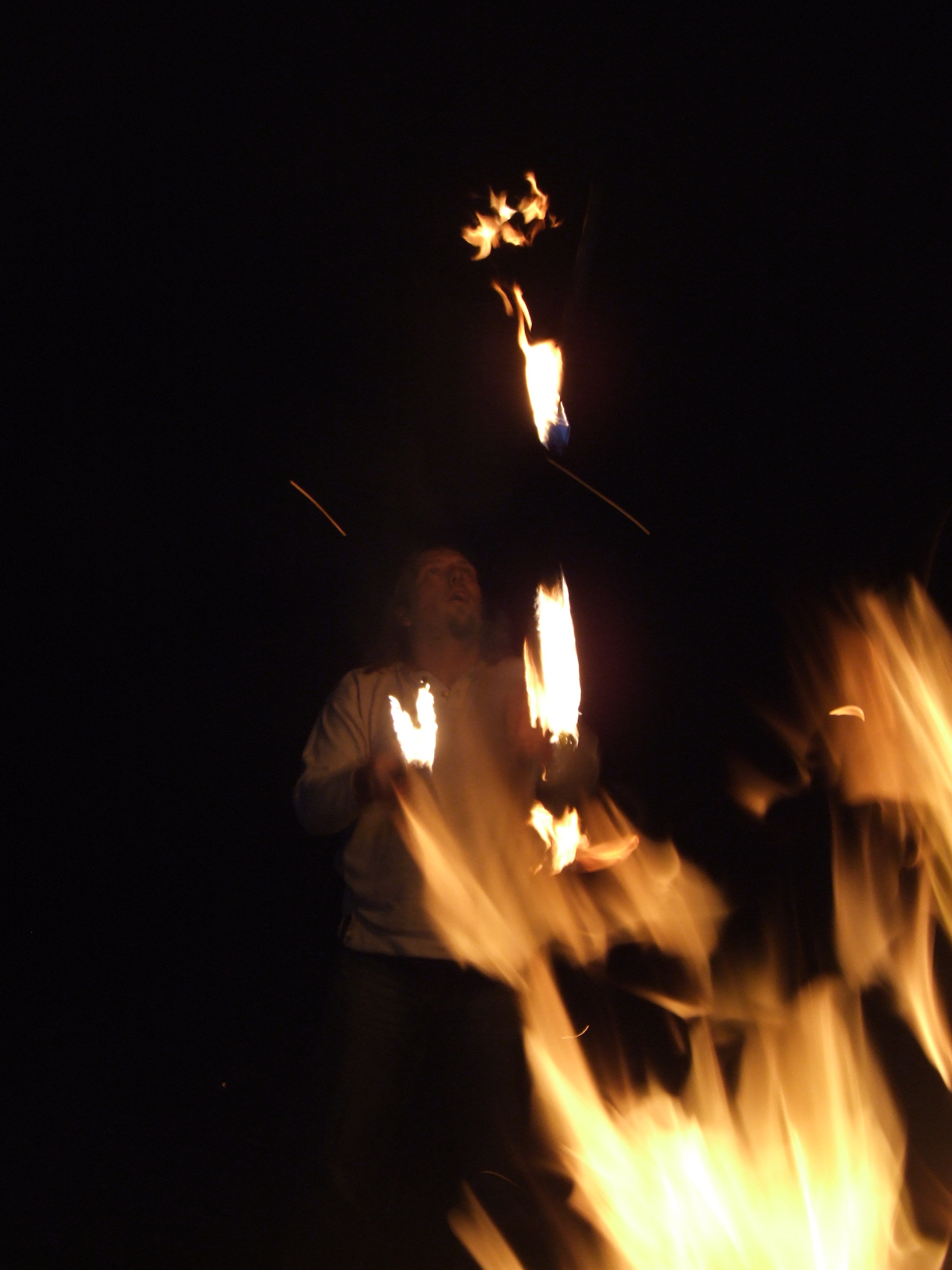 Full image of Dan juggling flaming clubs #4