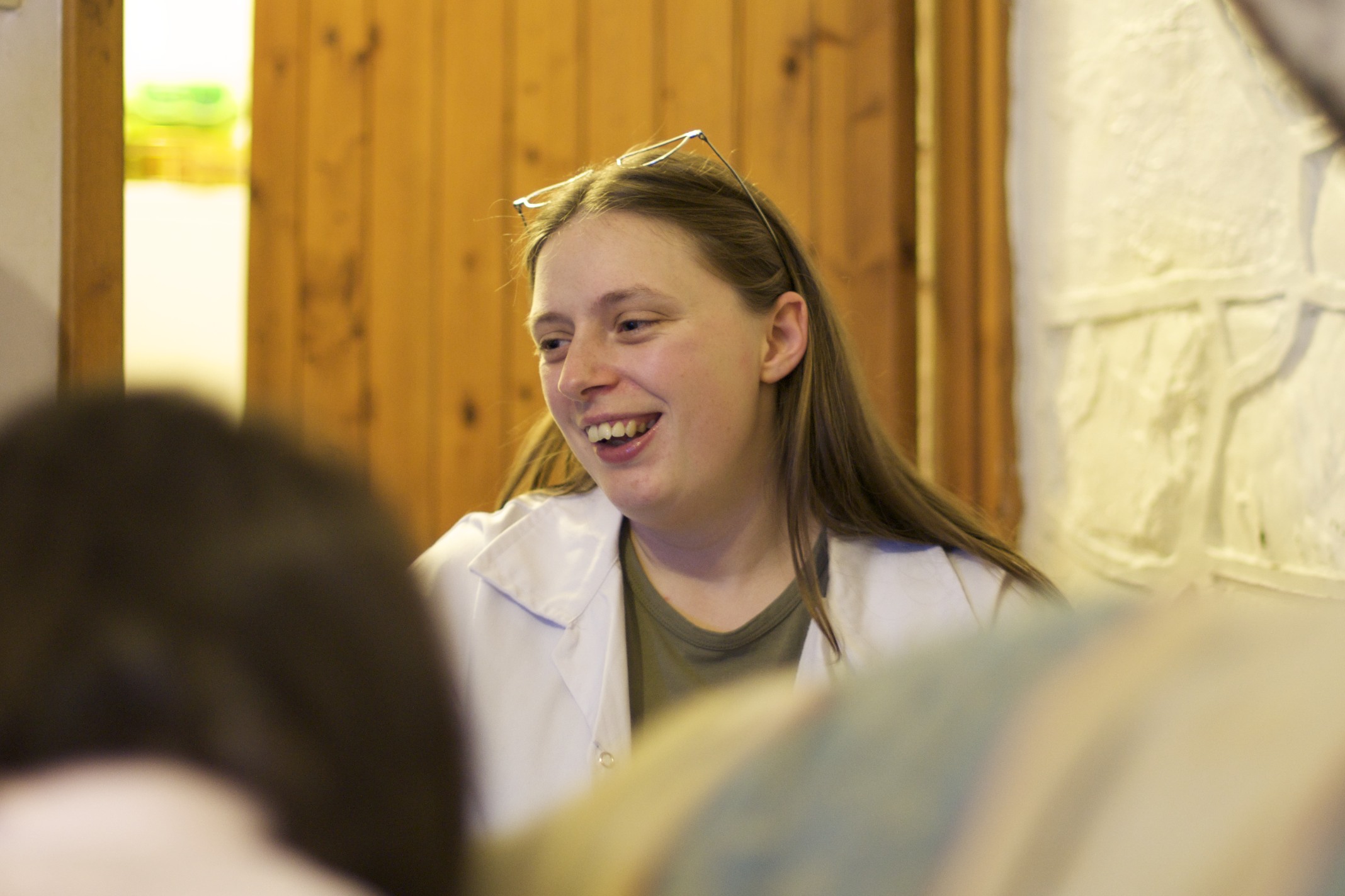 Full image of Ruth in a lab coat.