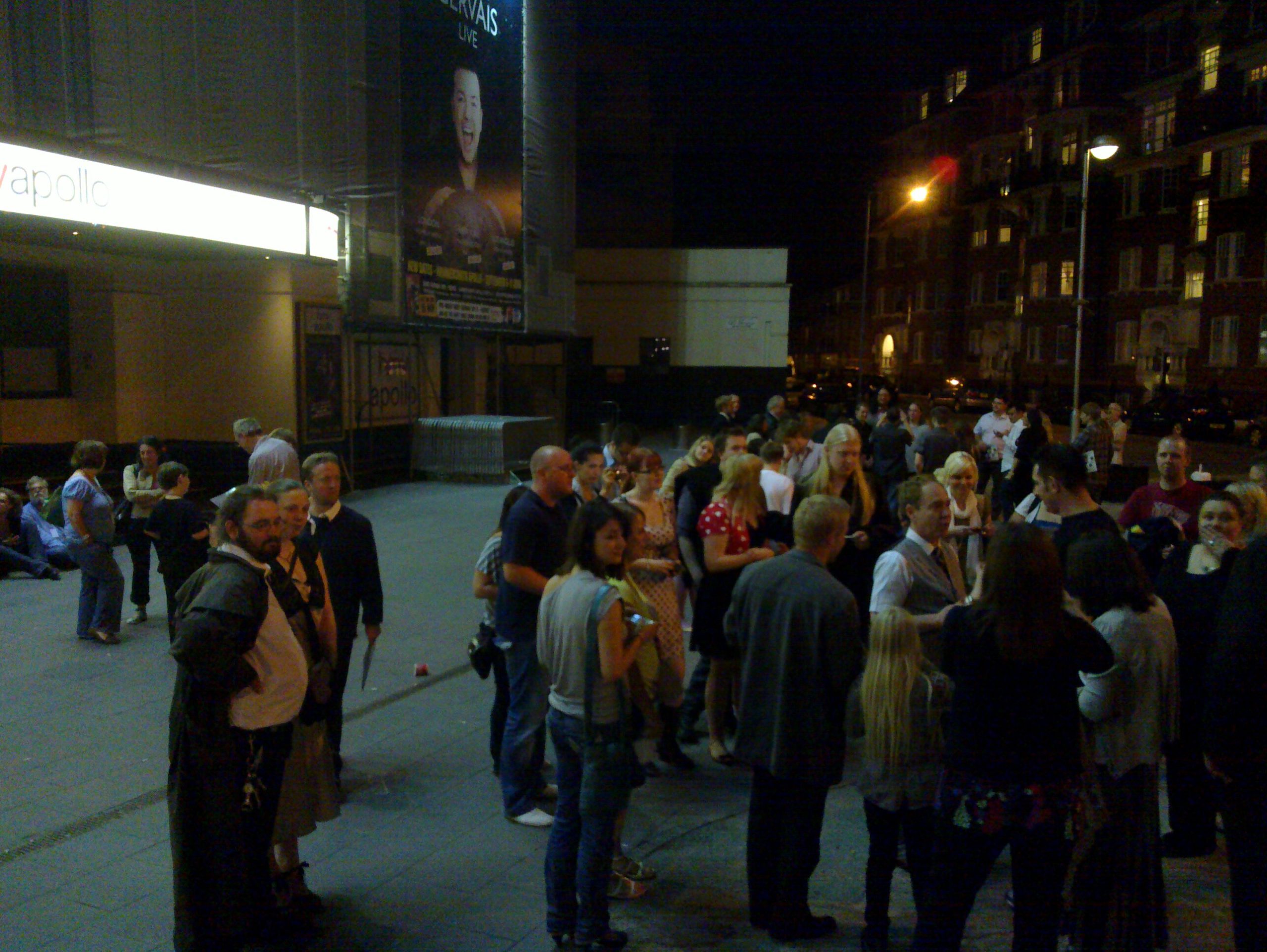 Full image of A crowd outside the theatre.