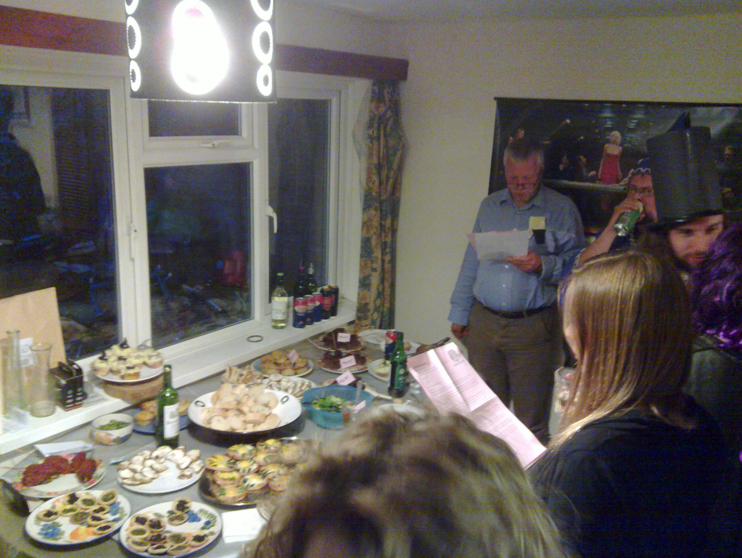 Full image of My dad looks puzzled by his script among a sea of magic-users.