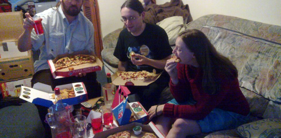 JTA, Paul and Ruth eat pizza and drink Earth Sunset.