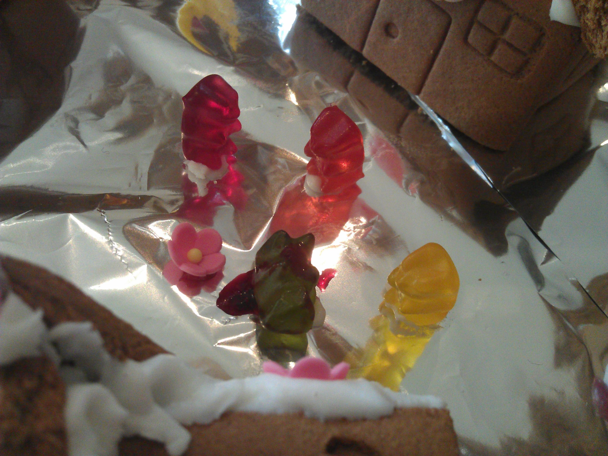 Full image of The first casualty; his gummy friends stand shocked around him. But with the orange bunny about to reach the South flank, there's nowhere to retreat: they must stand and fight!