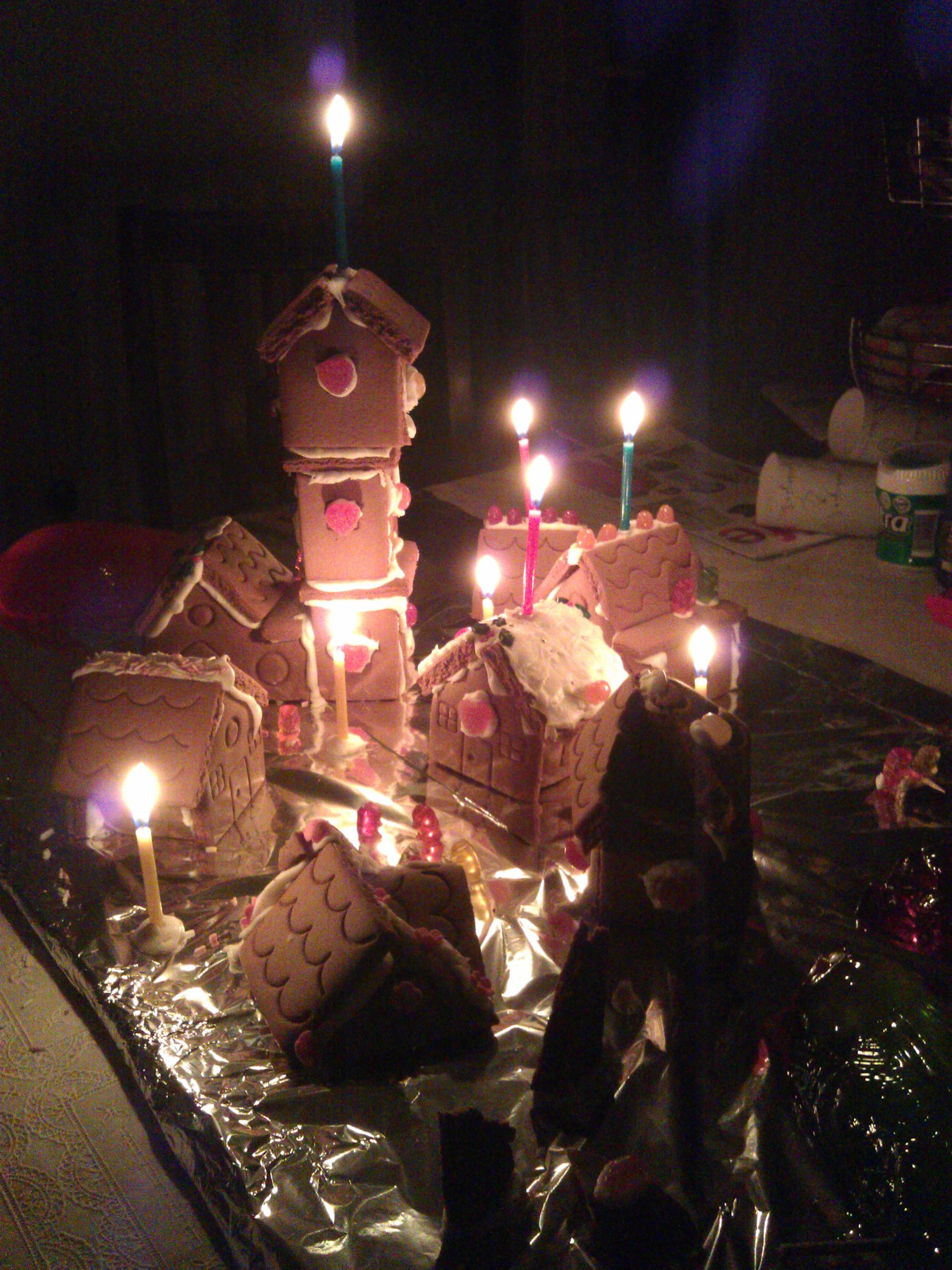 Full image of The village is lit as the battle against the bunnies continues throughout the night.