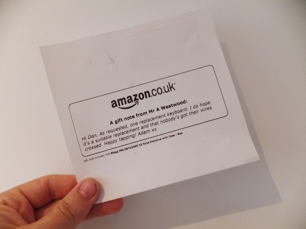Full image of A gift note from Mr. A Westwood: Hi Dan, As requested, one replacement keyboard. I do hope that it's a suitable replacement and that nobody's got their wires crossed. Happy tapping! Adam xx