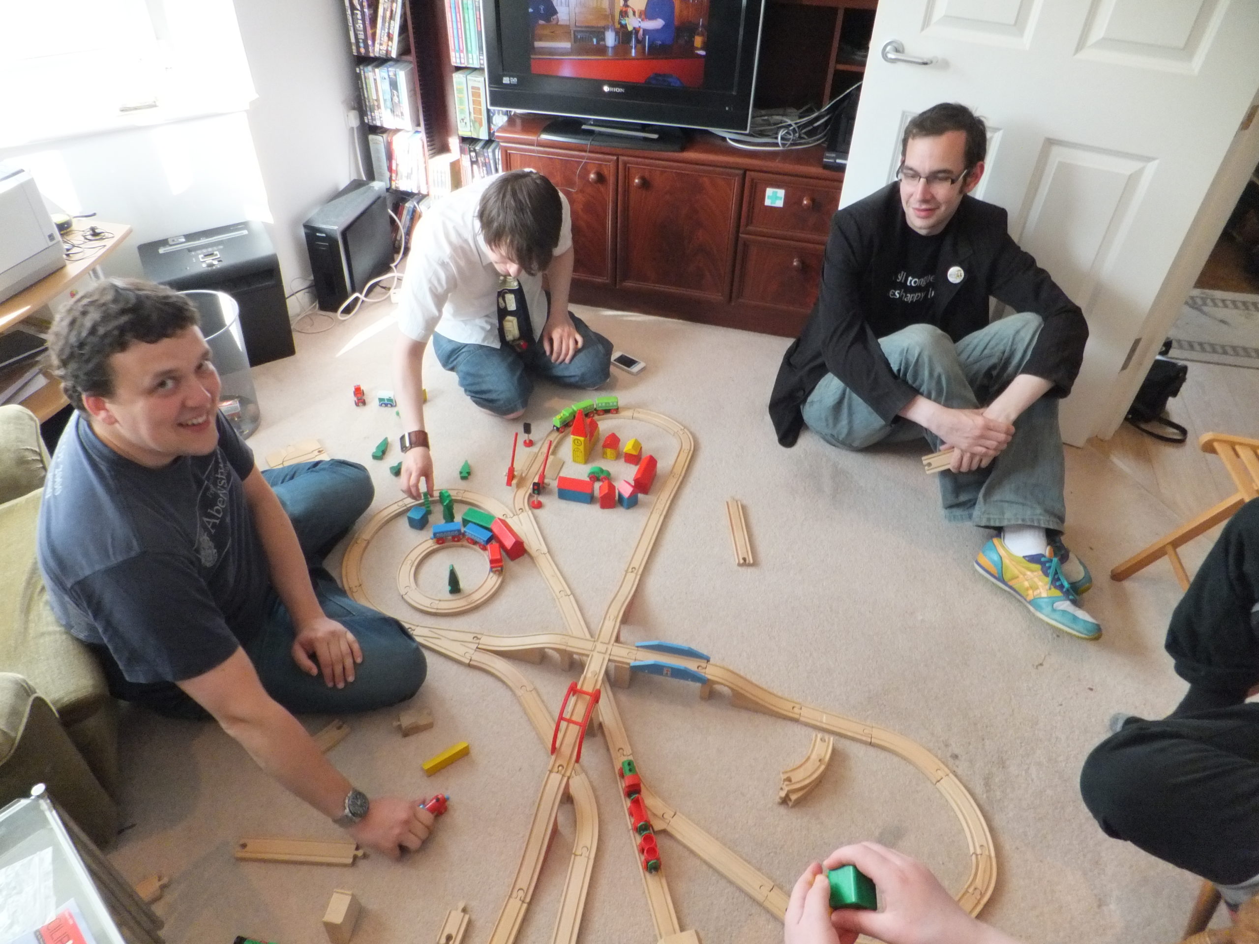 Full image of Gareth, Rory and Adam put the finishing touches on their (second) wooden railway layout.