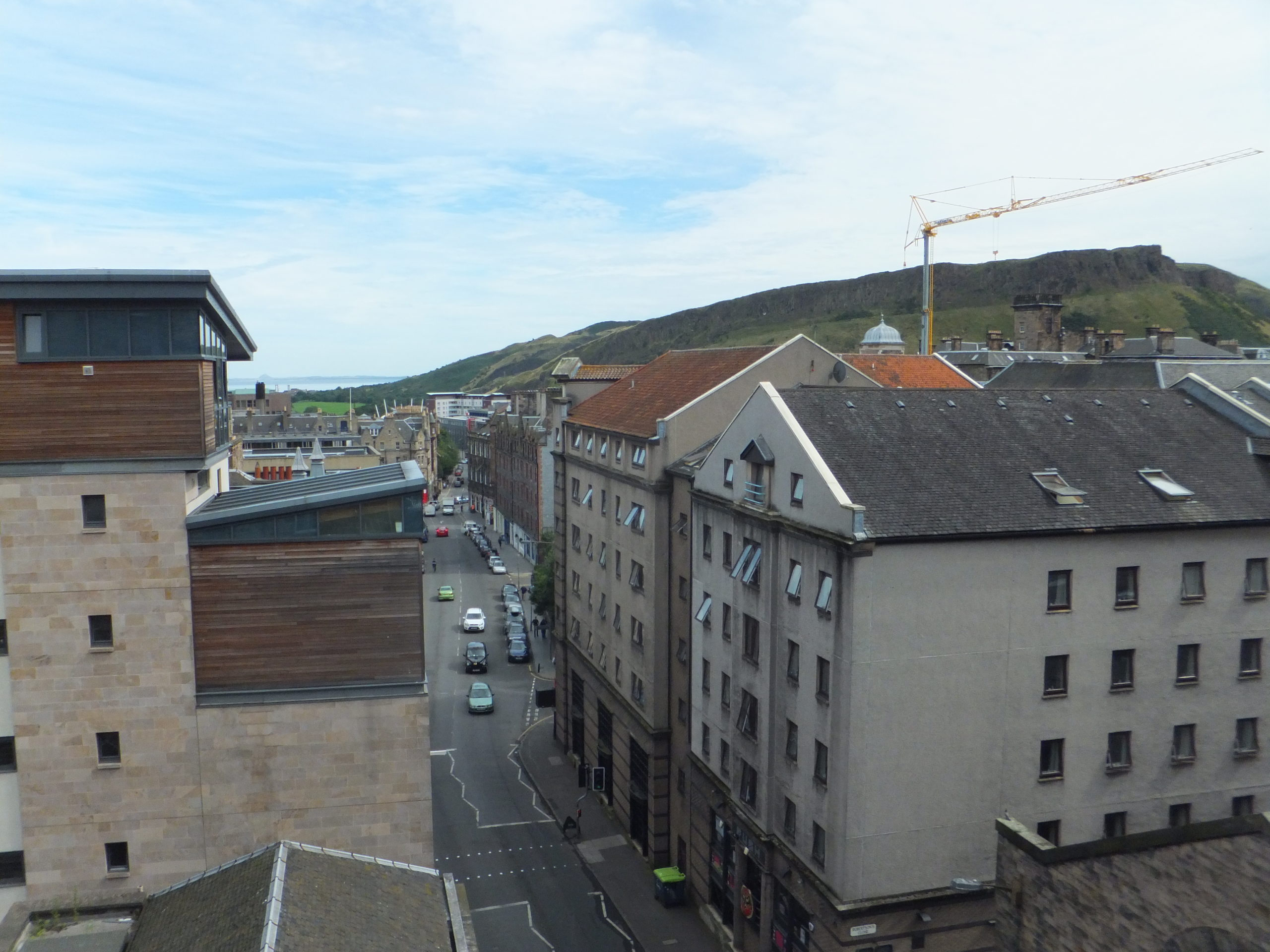 Full image of A view of Arthur's Seat, over the rooftops, from my bedroom window.