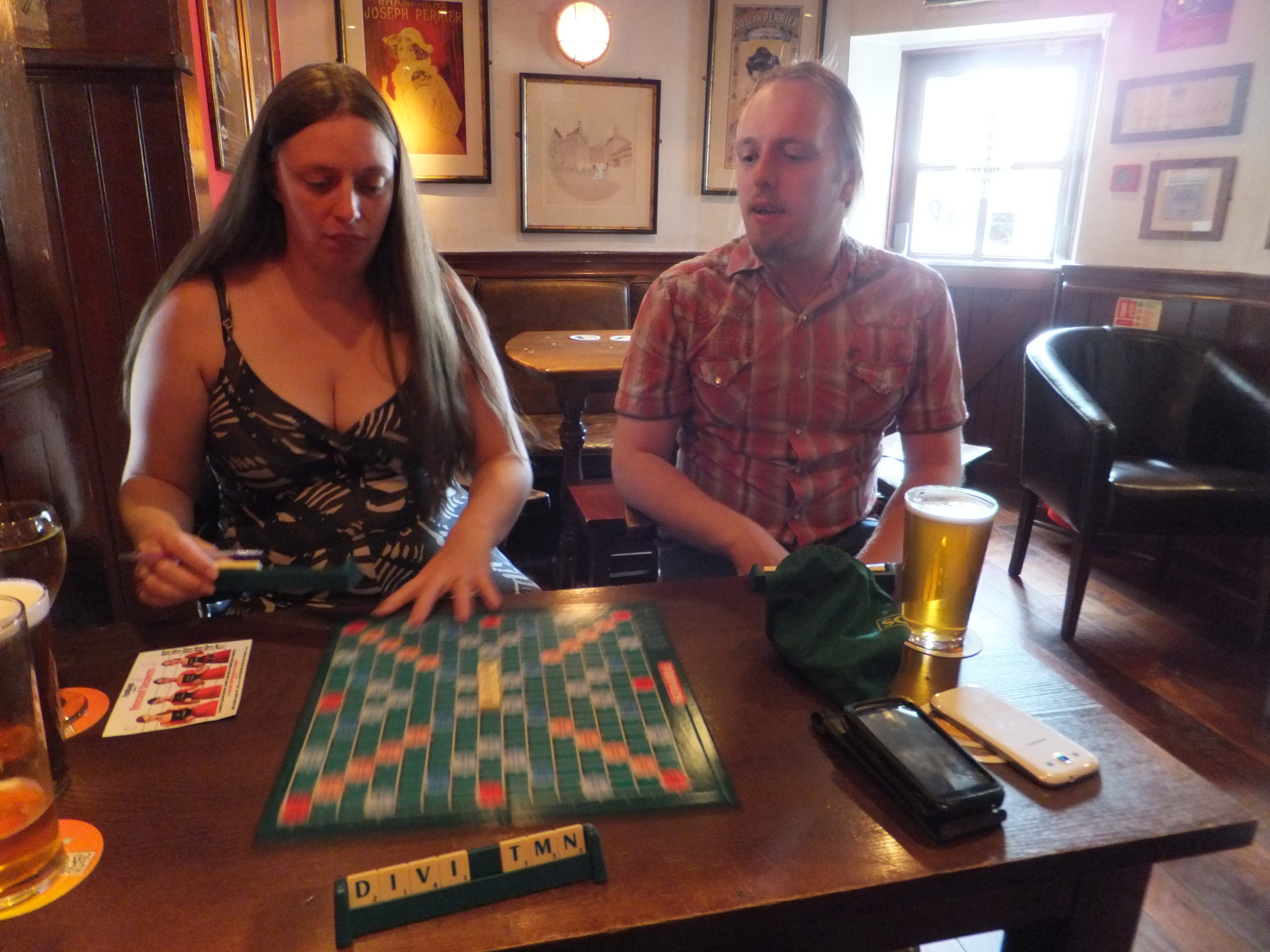Full image of Ruth and Dan playing Scrabble[TM] in a pub in Leith.