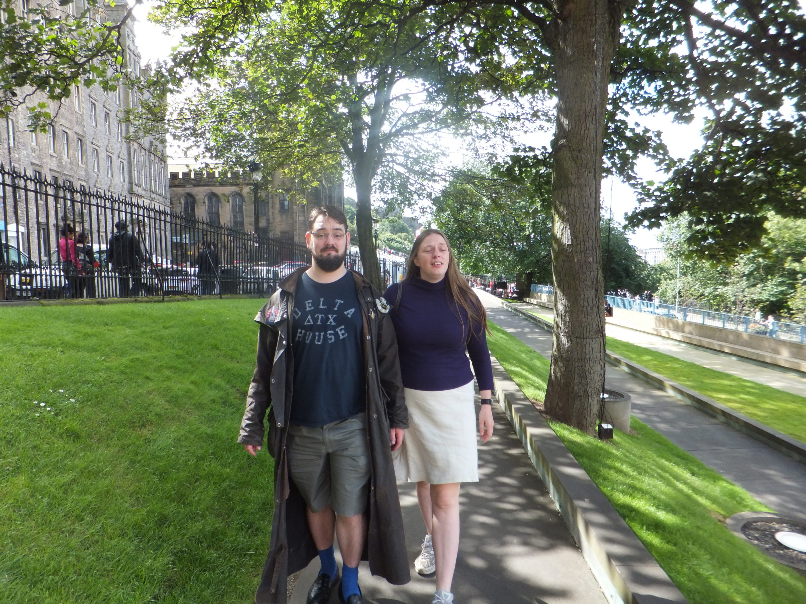 Full image of JTA and Ruth head along the path to the Mus£um On The Mound.
