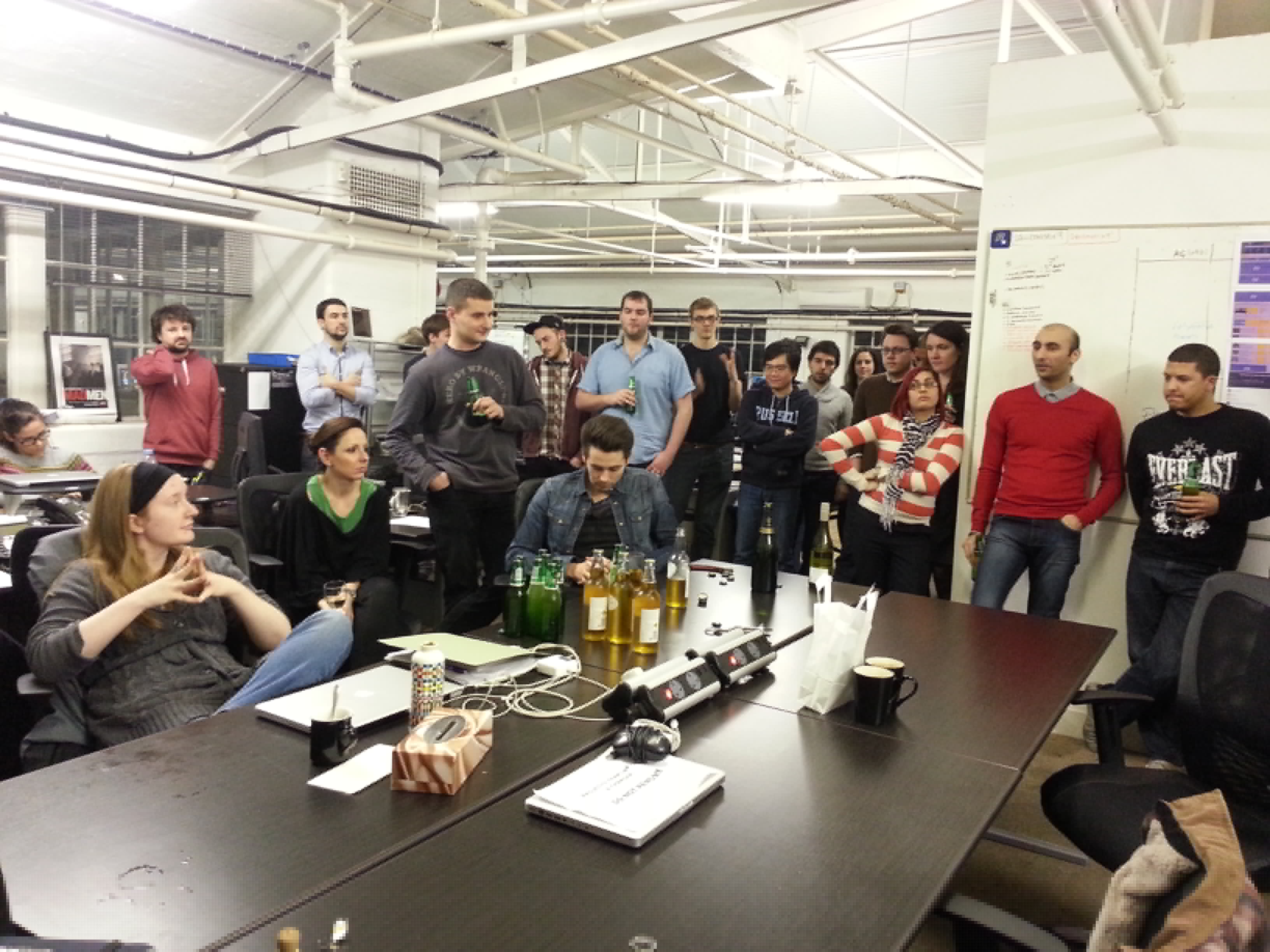 Full image of The team at Squiz's London office, debriefing over drinks at the end of a crazy week.