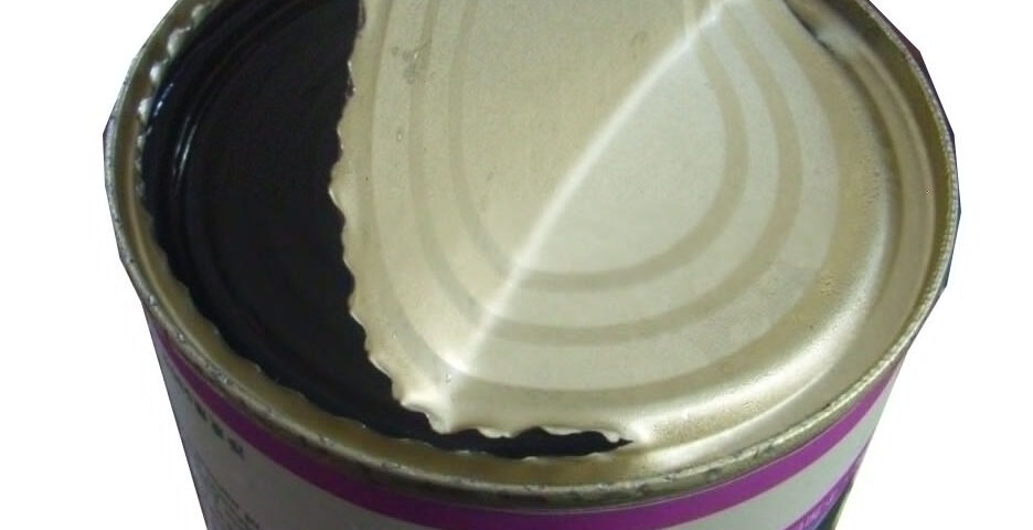 An opened food tin.