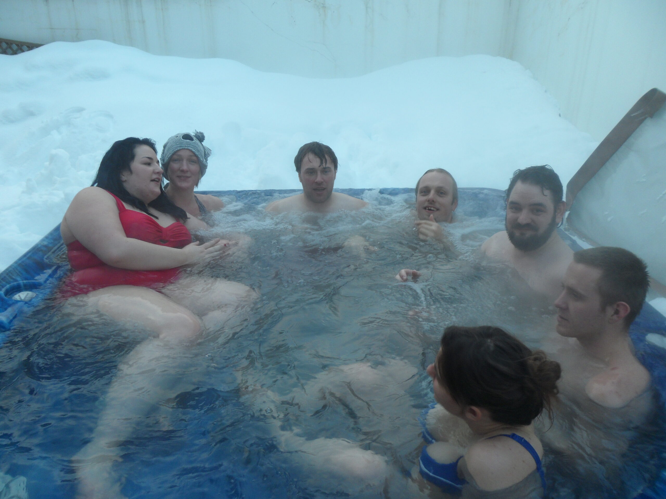 Full image of I'm sure that the hot tub was only meant to seat five or six, but that didn't stop us all piling into it at the end of a day's snowsports.