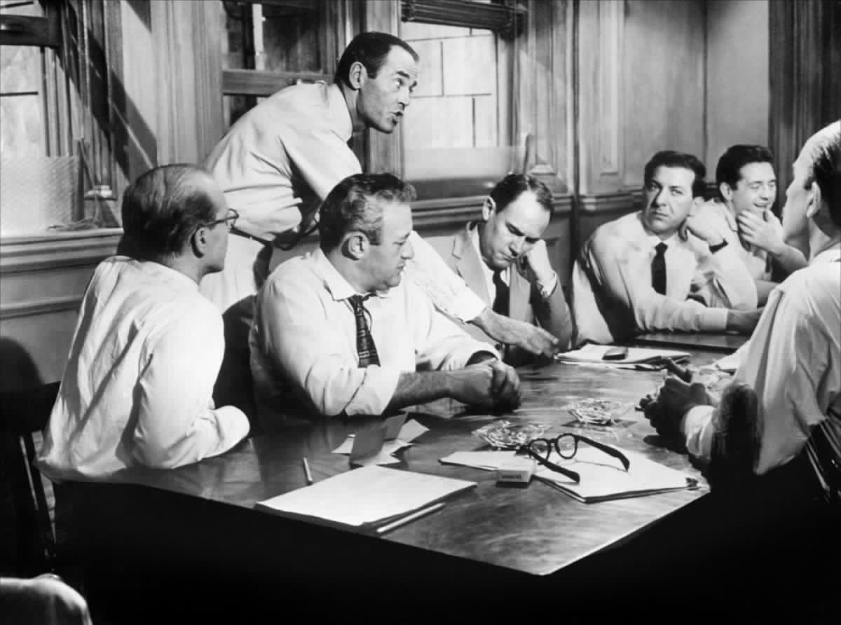 Full image of Scene from 12 Angry Men. Henry Fonda explains his vote of "not guilty".