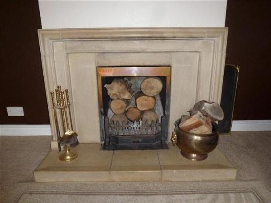 Full image of A wood-burning fire.