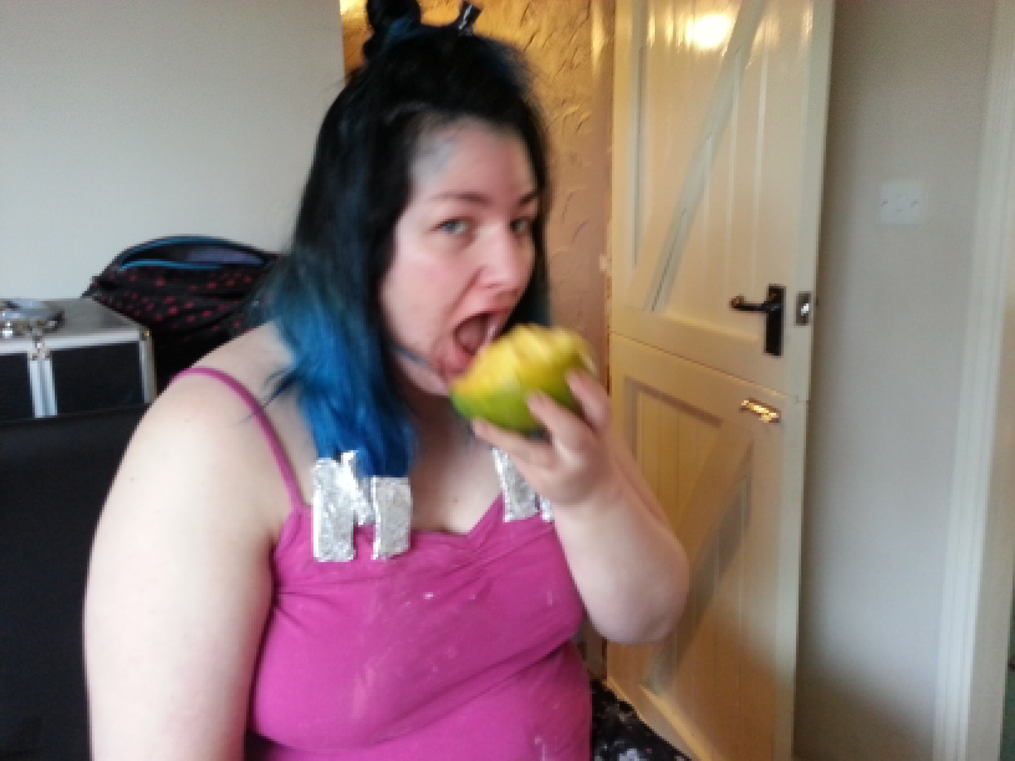 Full image of My sister devours a mango.