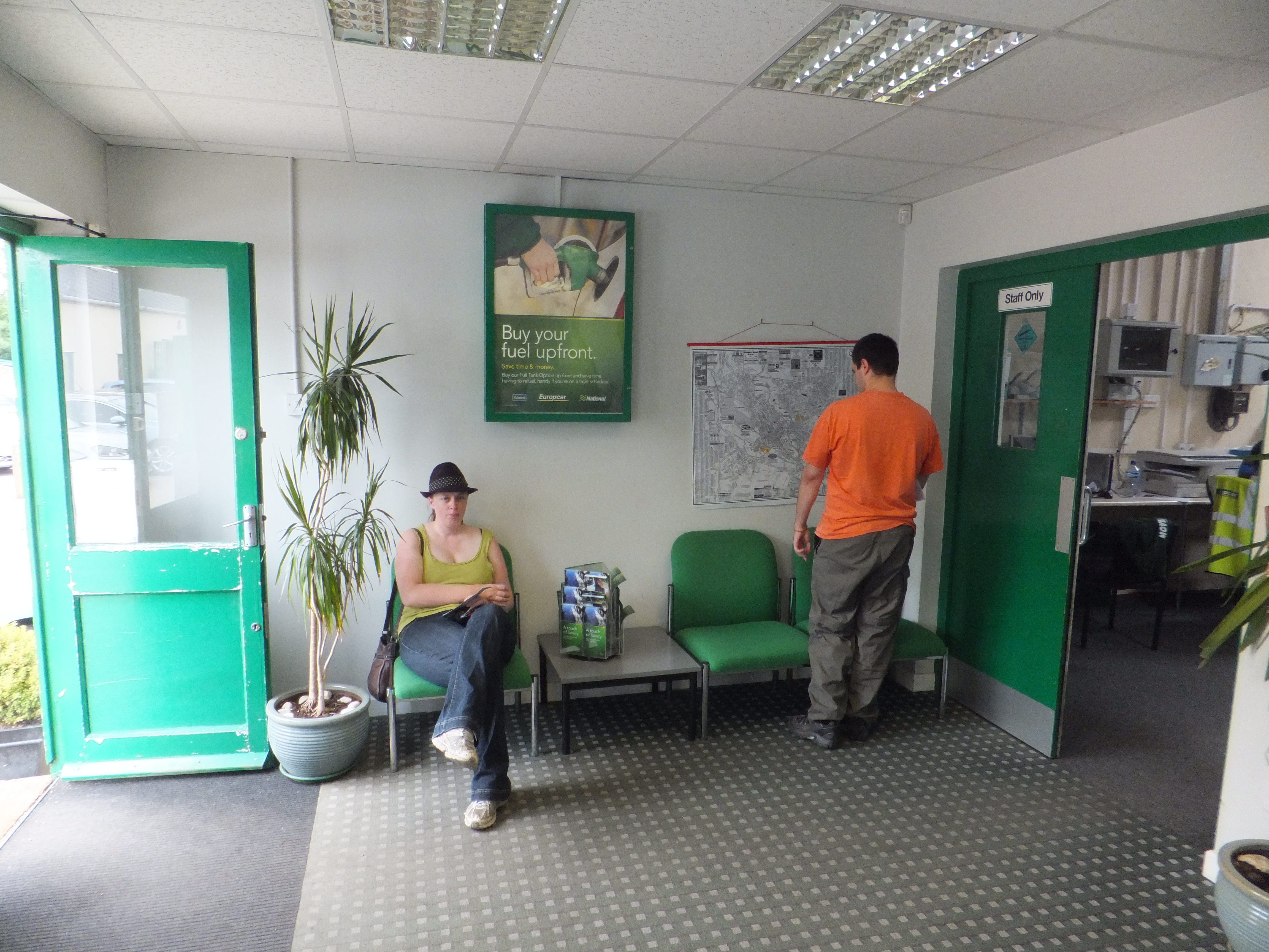 Full image of Ruth and Matt at the Europcar office.