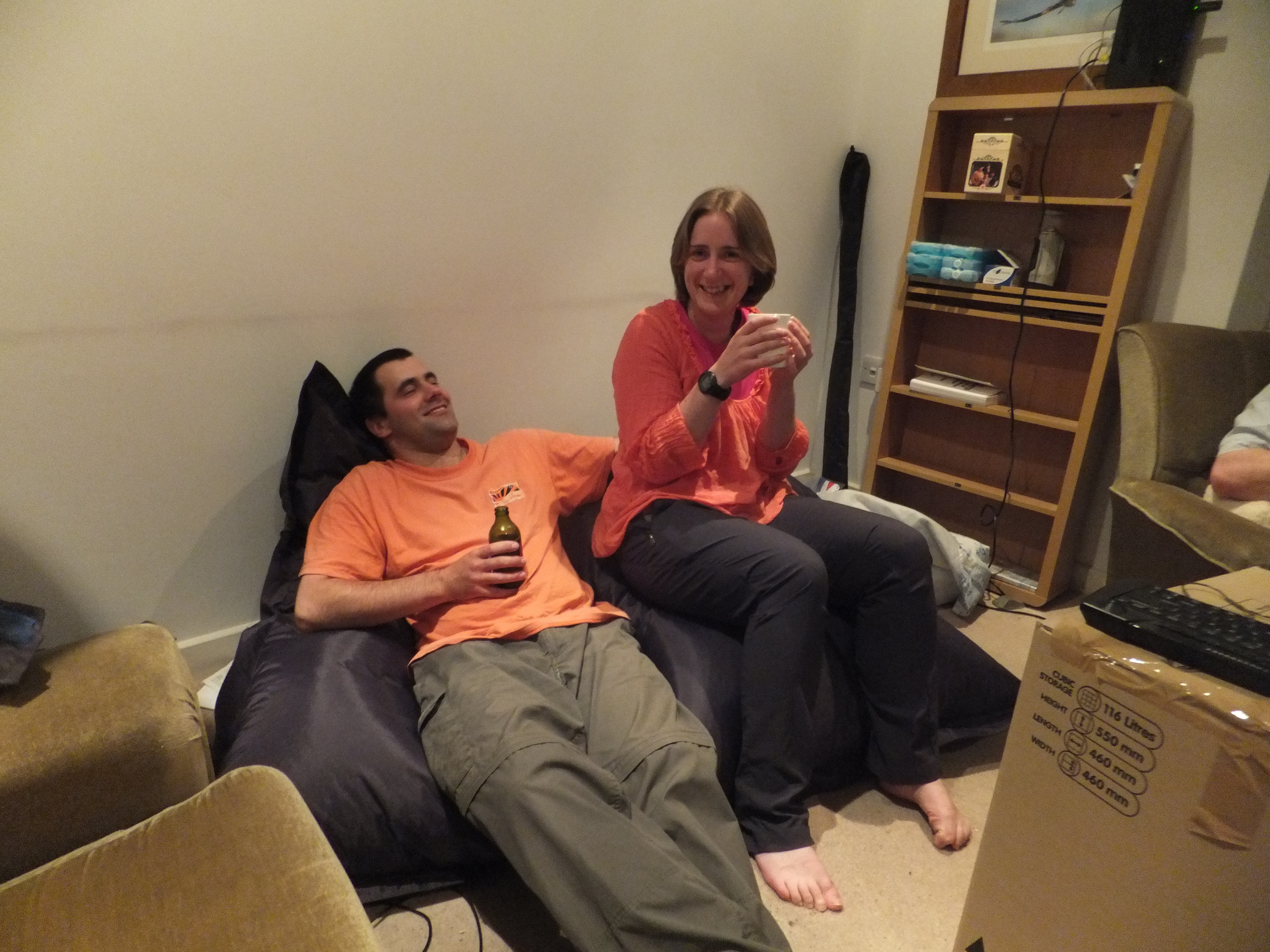Full image of Matt and Susan on a bean bag as we rest at the end of the first day's moving.