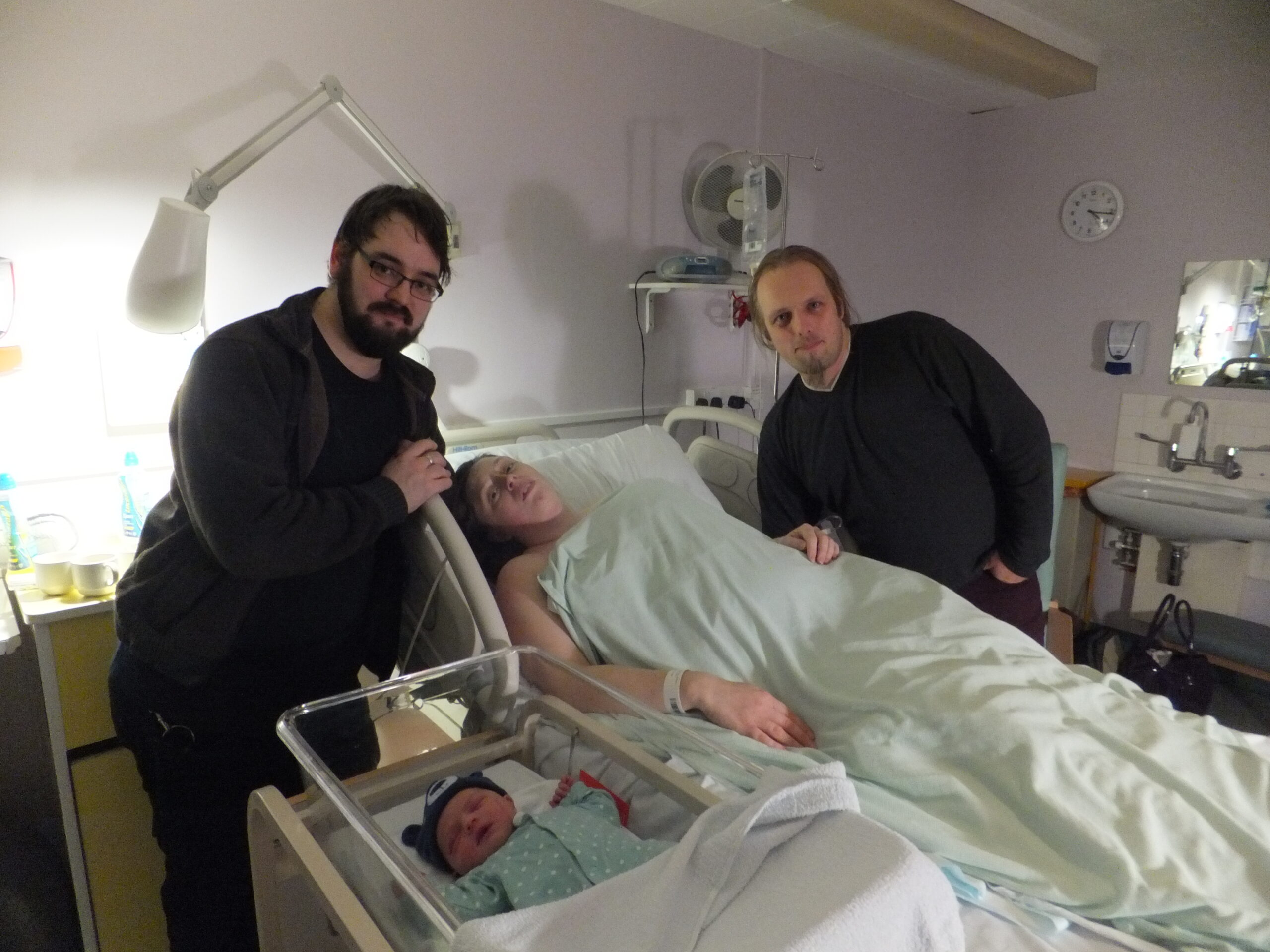Full image of Dan, Ruth, JTA and 'Tiny' in the delivery suite of the hospital.
