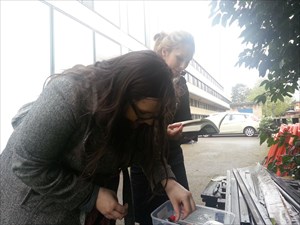 Liz and Kate sign "Wreck This Logbook"