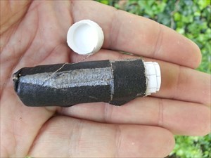 Geocache in my hand.