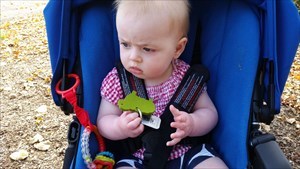 Baby Annabel with a geocache.