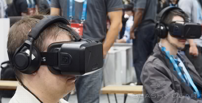 Full image of Two gamers wearing Oculus Rift headsets.