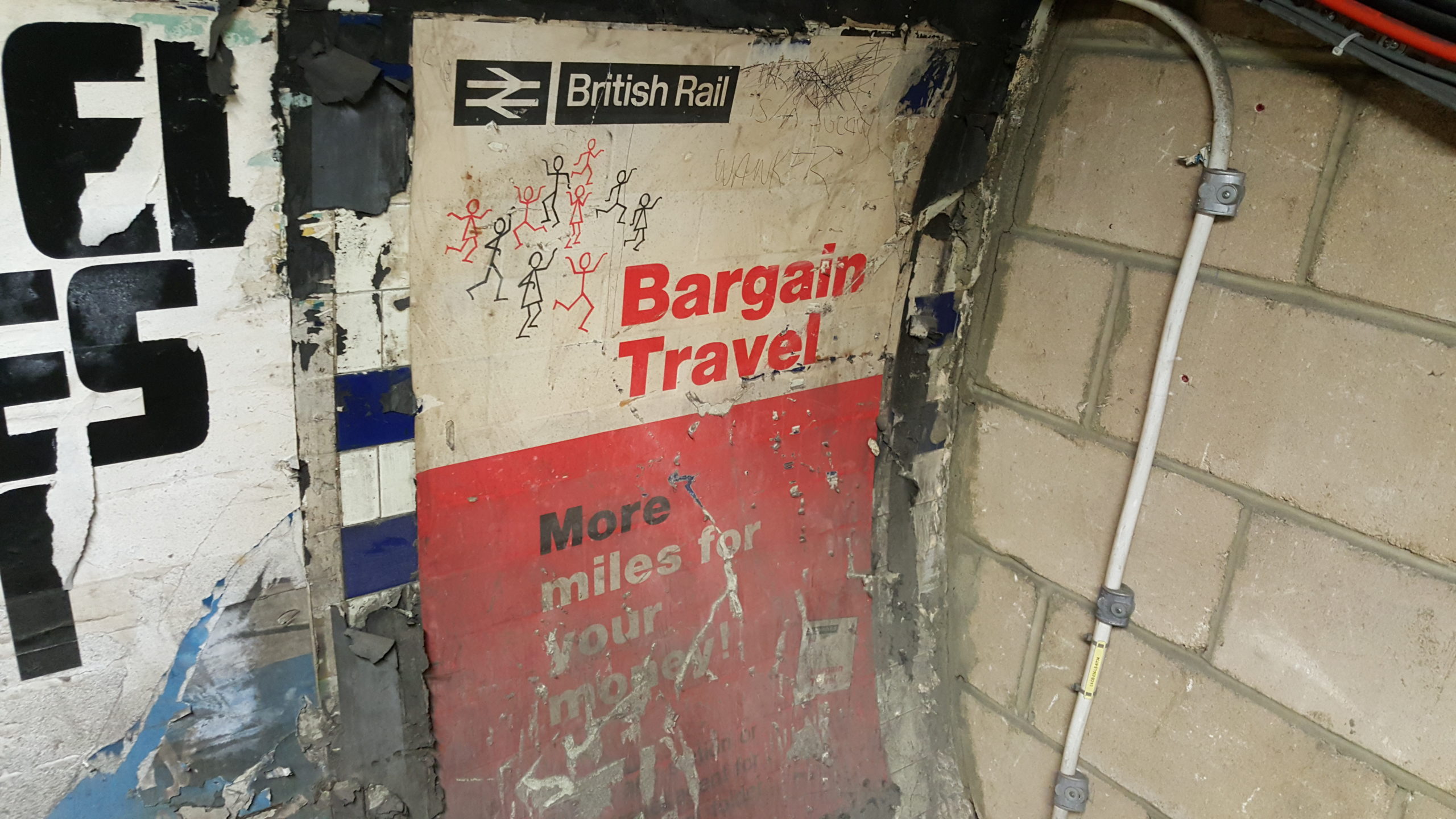 Full image of British Rail branded poster from an abandoned tunnel under Euston Station, circa 1960s.